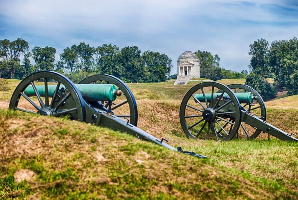 Cannons in front of the Illinois Monument in Vicksburg. Visit the Vicksburg Civil War Museum to understand more about the human stories.